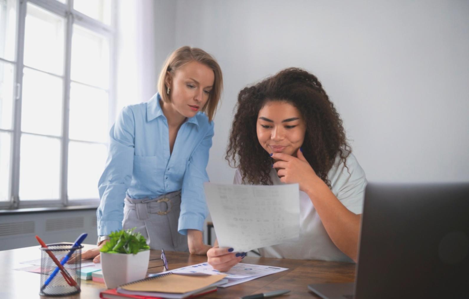 Professional budgeting consultation workspace with financial planning materials